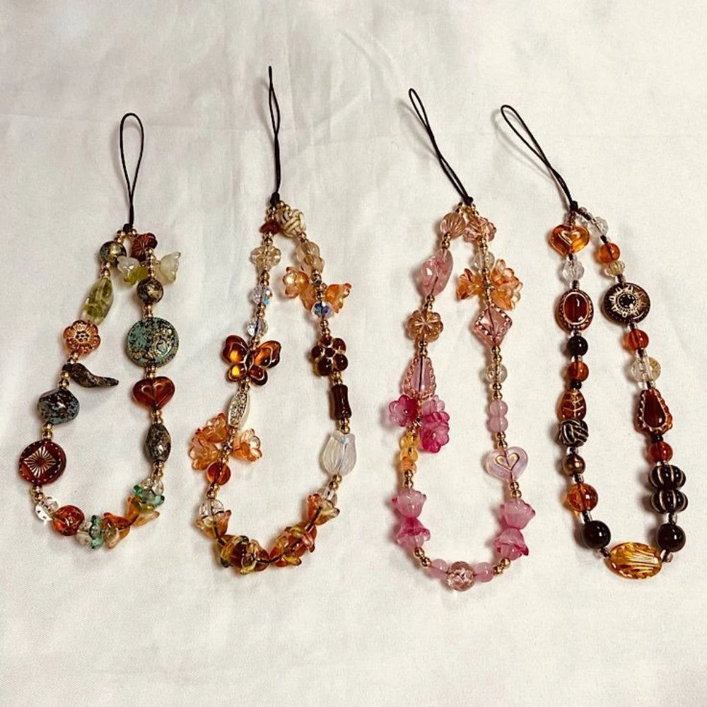 Five strands of colorful gemstone beads on anti-lost lanyards displayed against a white background.