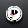 Silver foldable letter hanger hook with a pink and white flower design