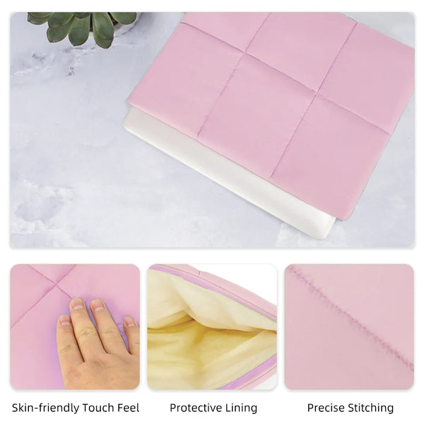 Pink puffy quilted laptop sleeve showing its texture, protective lining, and precise stitching detail.