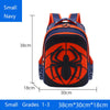 Small navy backpack featuring an orange spider design for kids