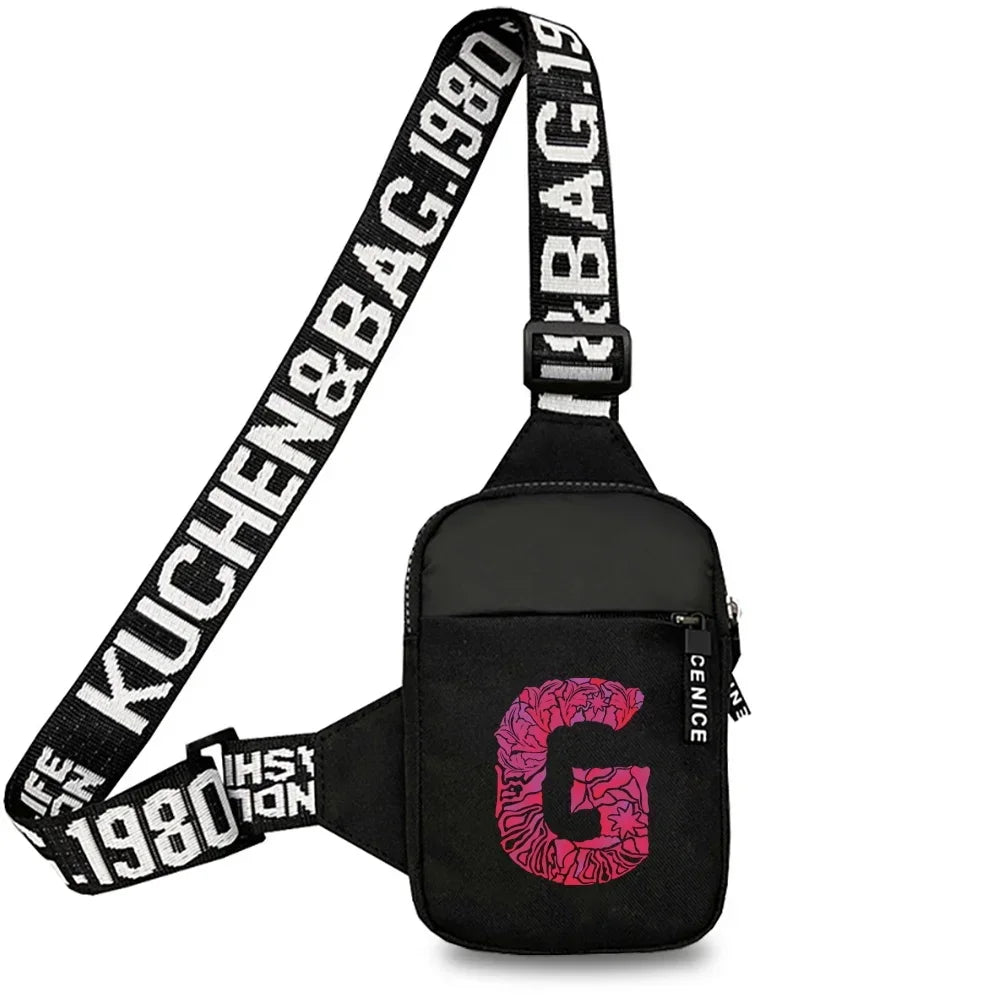 Schwarze Canvas-Tasche mit großem pinkem Initial G und schwarzem Riemen
