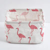 A white storage basket with a pink flamingo pattern, made of waterproof cotton linen, for desk organization.