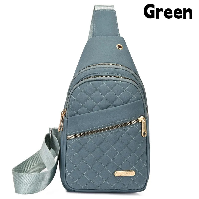 Graues gestepptes wasserdichtes Crossbody-Sling-Bag mit Reißverschluss und Trageriem.