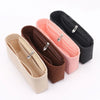 Three felt bag insert organizers in beige, pink, and black showing different zipper closures.