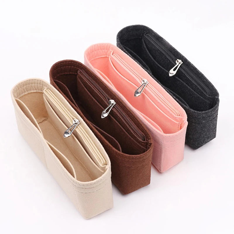 Three felt bag insert organizers in beige, pink, and black showing different zipper closures.
