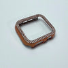 A rose gold glitter diamond rhinestone bumper case for an Apple Watch.
