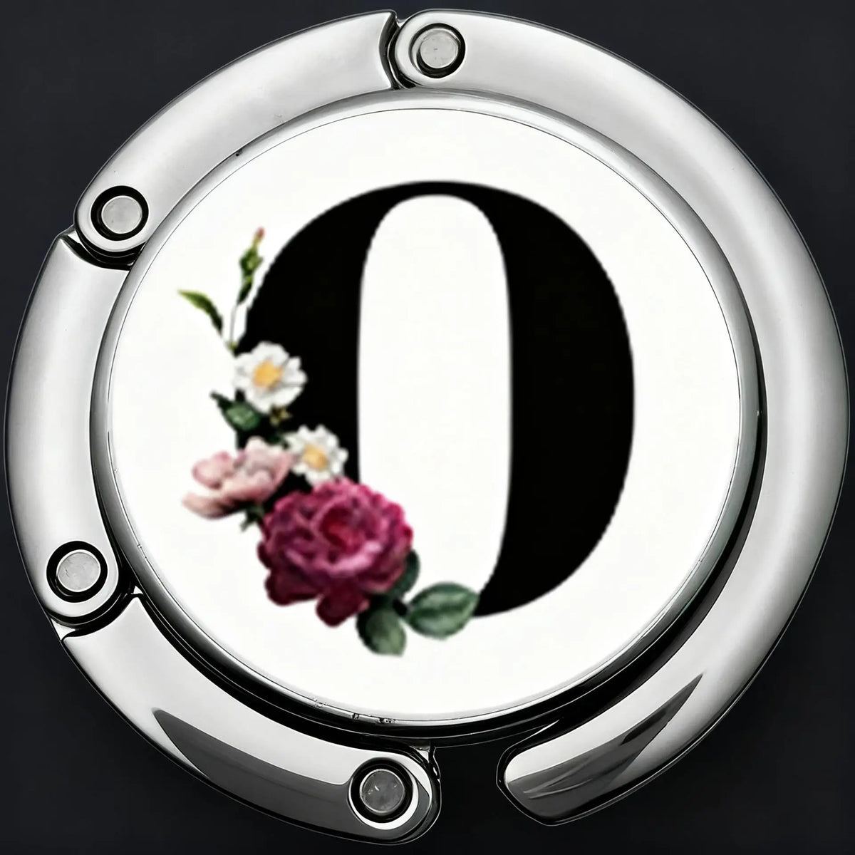 A silver foldable letter hanger hook for accessories with a decorative floral design.