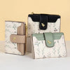 A beige and white patterned fashion PU leather slim card holder wallet with black trim and gold accents.
