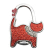 Silver handbag hooks shaped like a cat's head with pink accents and glitter finish