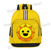 A yellow cartoon anime backpack featuring a smiling sun design and black and red stripes.
