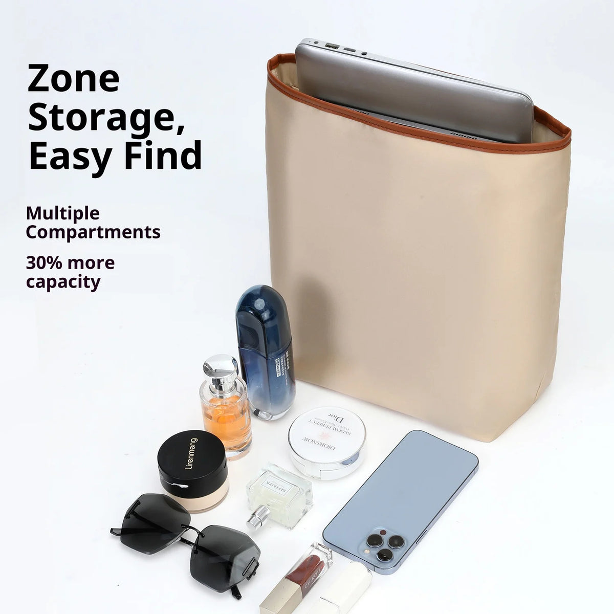A beige satin bag organizer insert with multiple compartments is shown alongside various small electronic devices and accesso