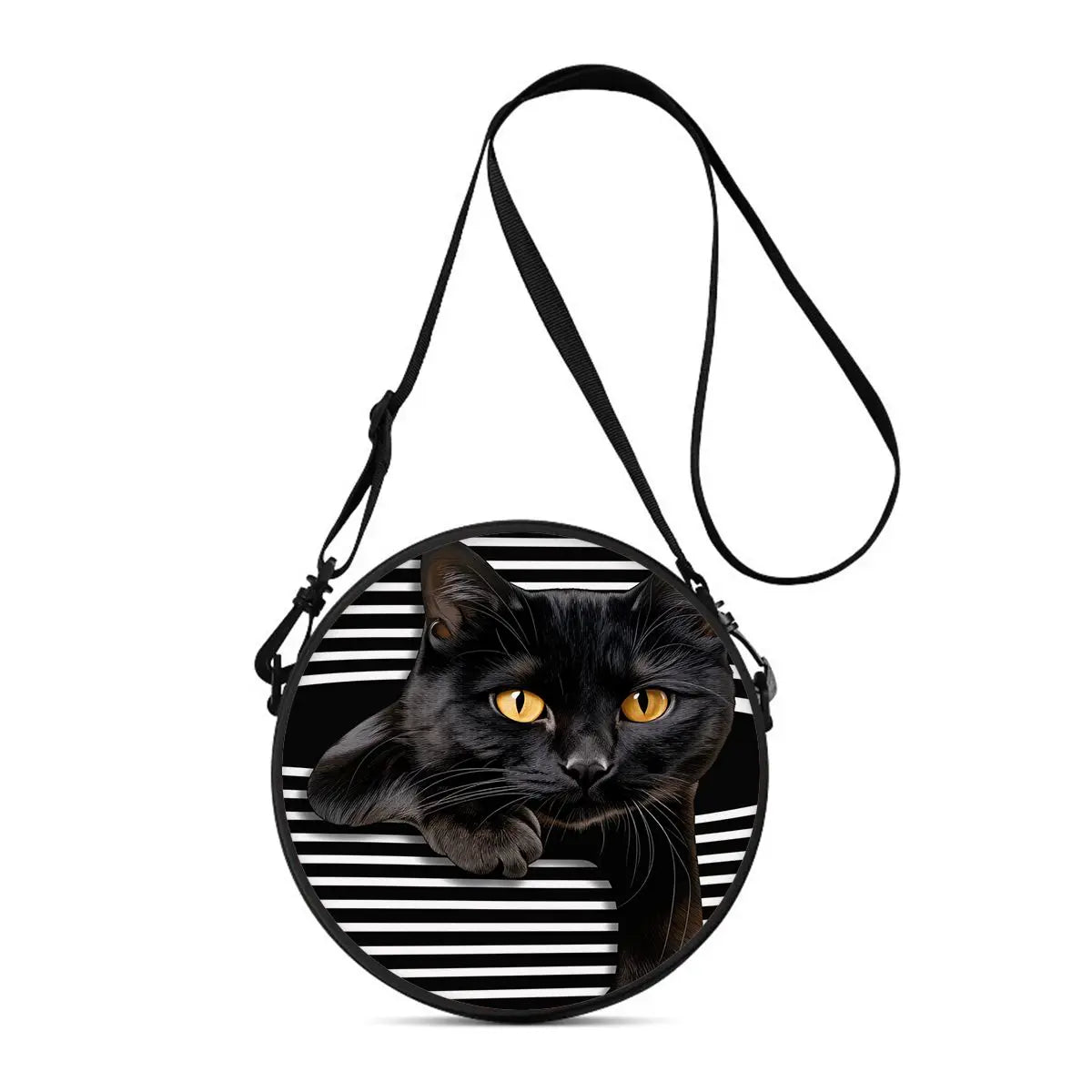 A black cat face is featured on a round black and white striped crossbody bag with a black strap.