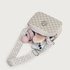 A light pink patterned crossbody bag with a beige strap and attached sunglasses.