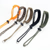 Handwoven paracord camera wrist straps in orange, brown, and black colors