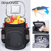 A black insulated thermal cooler backpack with a lid, showing various food items and an ice cube.