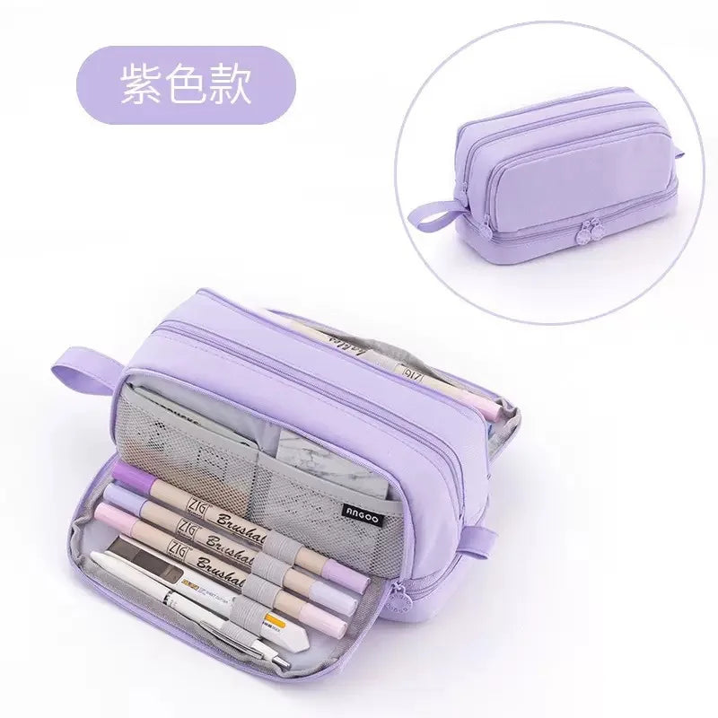 A purple multifunctional pencil case with multiple compartments and a matching zippered pouch.