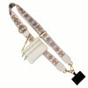 A beige phone lanyard with a decorative patterned strap and a detachable leather wallet.