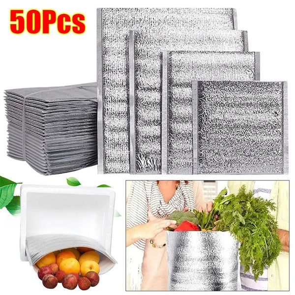 A stack of 50 insulated thermal food delivery bags with aluminum foil lining, shown next to a person preparing food.