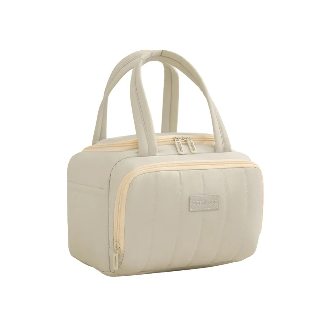 Bolsa térmica reutilizable beige con ribete beige claro y detalles de cremallera.