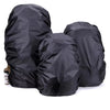 Black heavy-duty outdoor camping backpack rain cover shown in a folded or rolled state.
