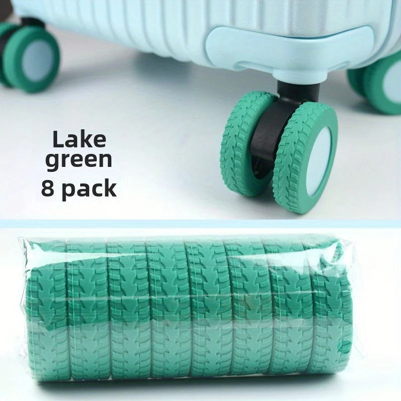 A set of eight lake green travel luggage wheel protectors packaged in a clear plastic bag.