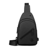 A black lightweight nylon crossbody sling bag shown from the back.