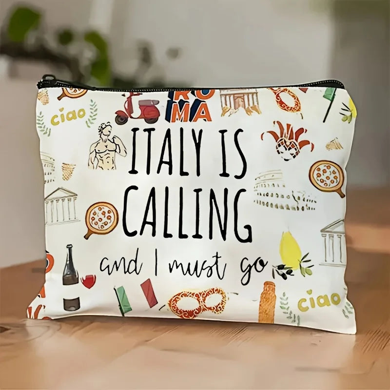 A white zippered makeup bag featuring text and illustrations related to Italy, including 'Italy is calling' and Italian motif