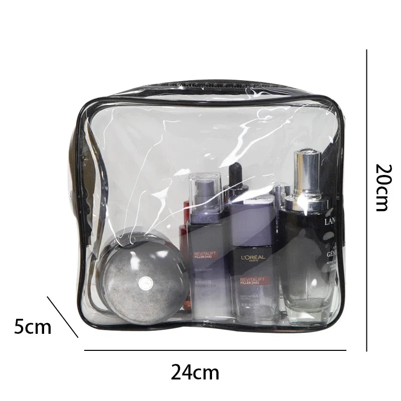 A clear plastic travel toiletry bag containing three glass bottles of liquid products.