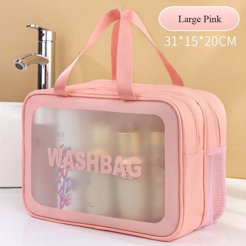 Large pink double-layer clear and dry wash bag with pink straps and a transparent window.