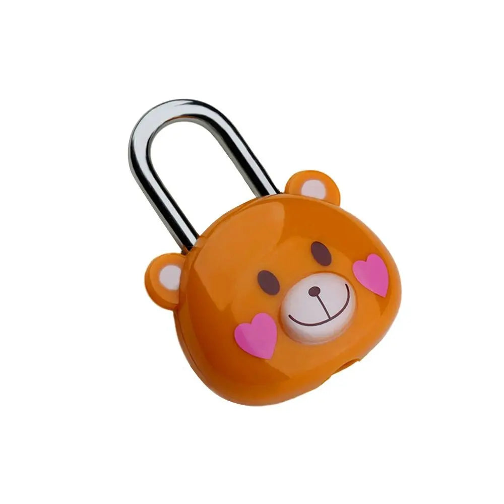An orange cartoon bear shaped padlock with a silver shackle.