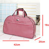 A pink and red striped PU leather travel duffel bag with handles shown in a studio setting.