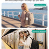 A woman wearing a beige sweater and carrying a tan laptop backpack is standing on a wooden pier overlooking the sea.