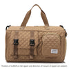 A tan nylon travel duffle bag featuring a quilted pattern and brown handles.
