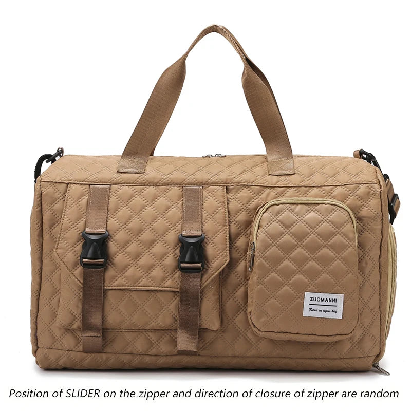 A tan nylon travel duffle bag featuring a quilted pattern and brown handles.