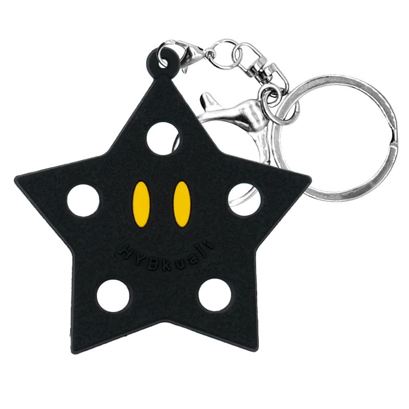 Porte-clés en forme d'étoile noire en silicone avec anneau à cliquet argenté.