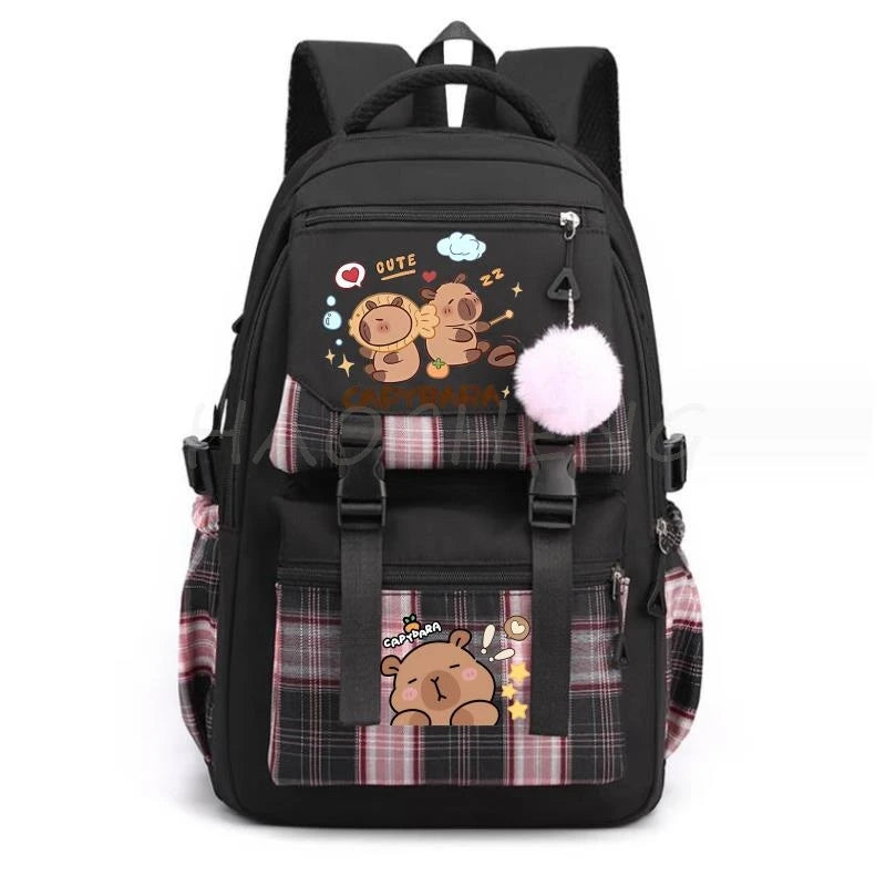 Black canvas backpack featuring a cute capybara print and plaid fabric details.