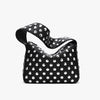A black shoulder bag covered in silver metal rivets and studs.