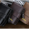 Three brown and black PU leather card holder wallets are displayed on a dark wooden surface.
