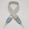 A light blue and beige braided nylon strap for a bag, featuring gold-toned metal hooks.
