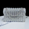 Silver rhinestone leather evening clutch bag with a textured, sparkling surface.