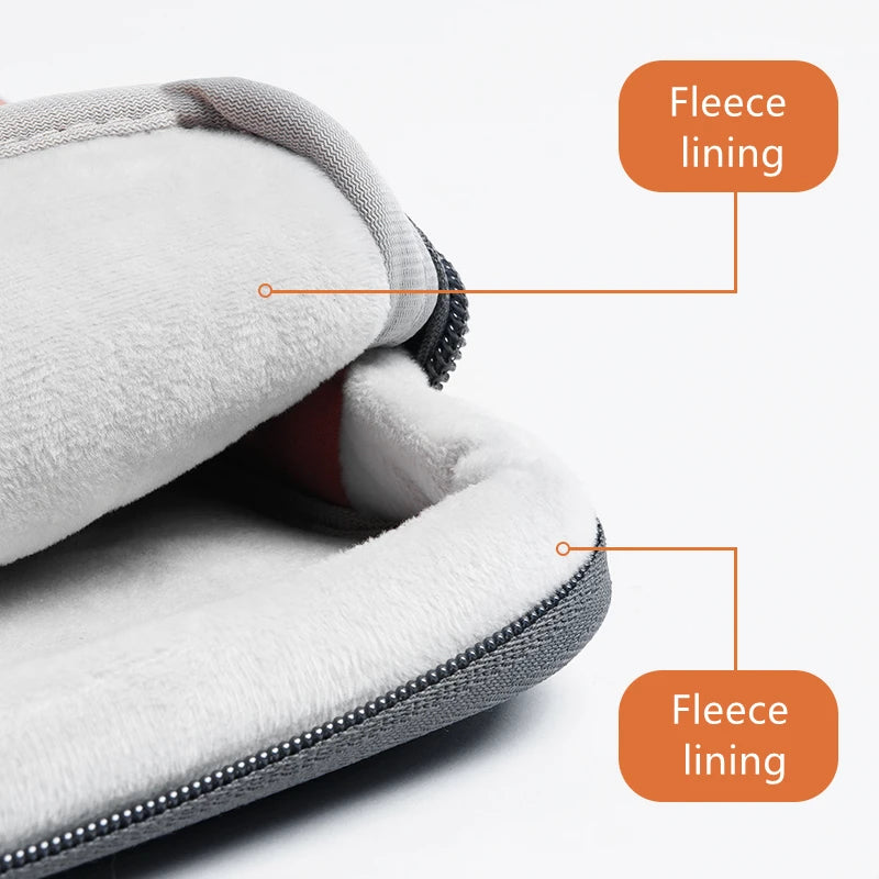 Close-up view of a gray fleece-lined laptop sleeve with a zipper and handle detail.