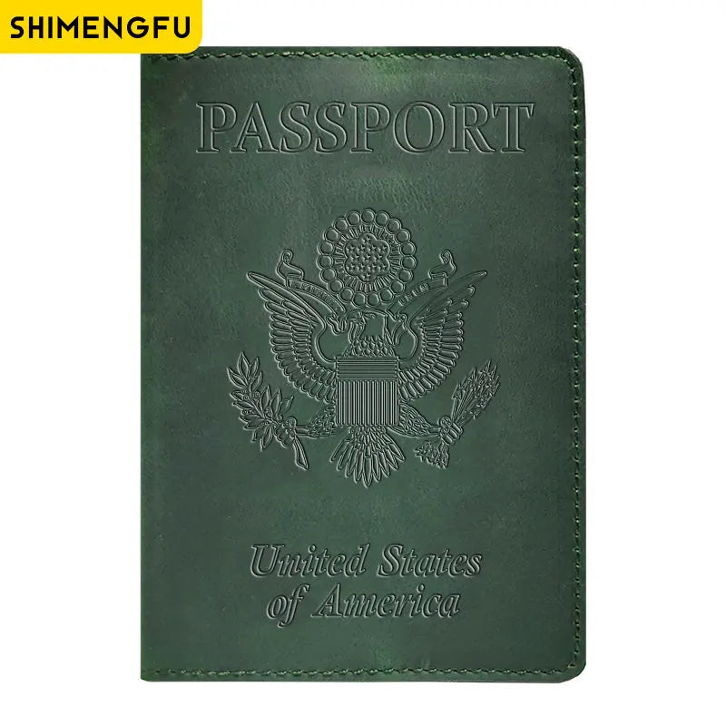 A dark green genuine leather passport holder embossed with the United States of America eagle design.