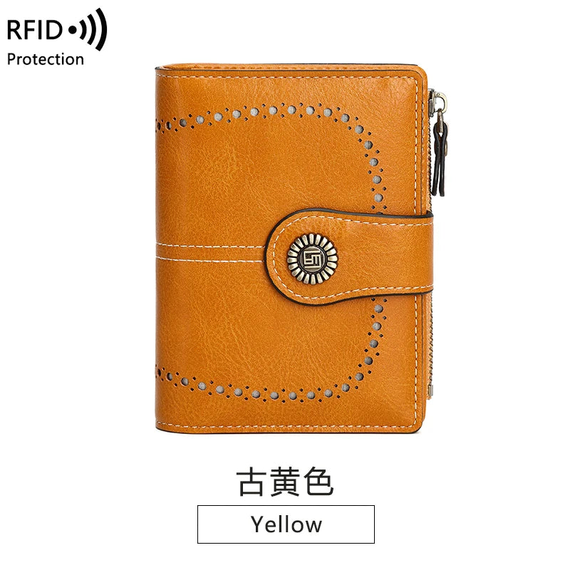 A brown leather multi-fold wallet with stitching and a decorative metal emblem.