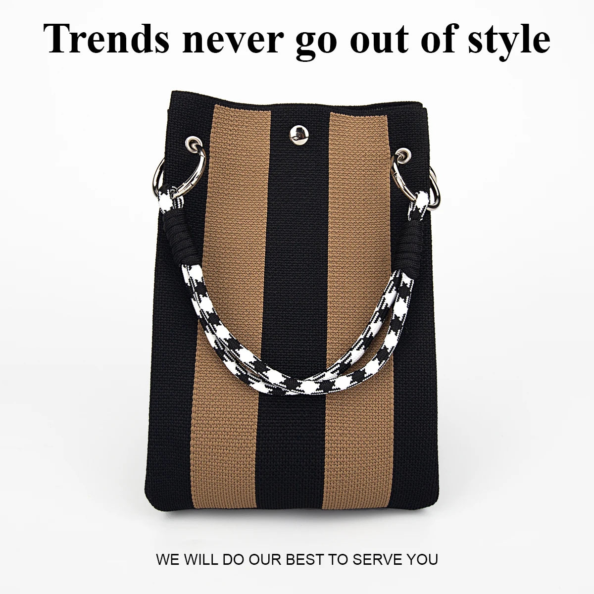 A black and tan striped knitted tote bag with silver hardware.