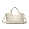 A beige leather women's casual crossbody shoulder bag with a zip closure.