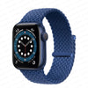 A dark blue braided solo loop stretch band worn around an Apple Watch.