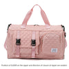 Pink nylon travel duffle bag with a quilted pattern and pink fabric handles