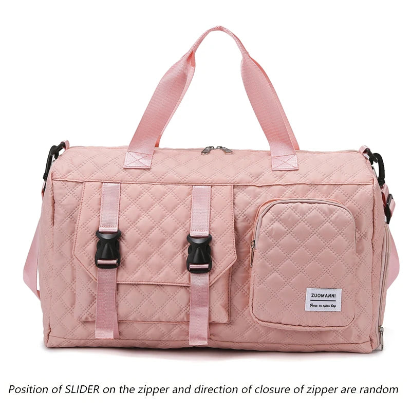 Pink nylon travel duffle bag with a quilted pattern and pink fabric handles