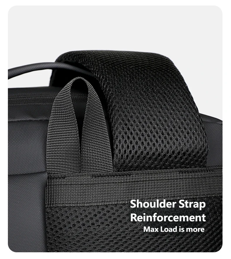 Close-up of a black expandable travel backpack showing shoulder strap reinforcement.