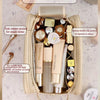 A beige PU leather travel makeup organizer with multiple compartments and double zippers for storing cosmetics.